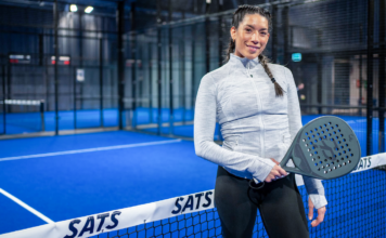 SATS utvecklar padelverksamheten – satsning på träning för barn Padelspelande tjej på SATS