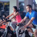 Gymmusik lanserar AI-röster för effektiv medlemskommunikation Cykelträning på gym