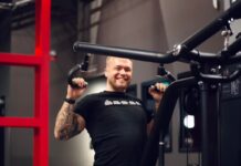 Friskis&Svettis ökar takten – sju nya gym öppnar 2026 Ung man tränar styrketräning på Friskis&Svettis
